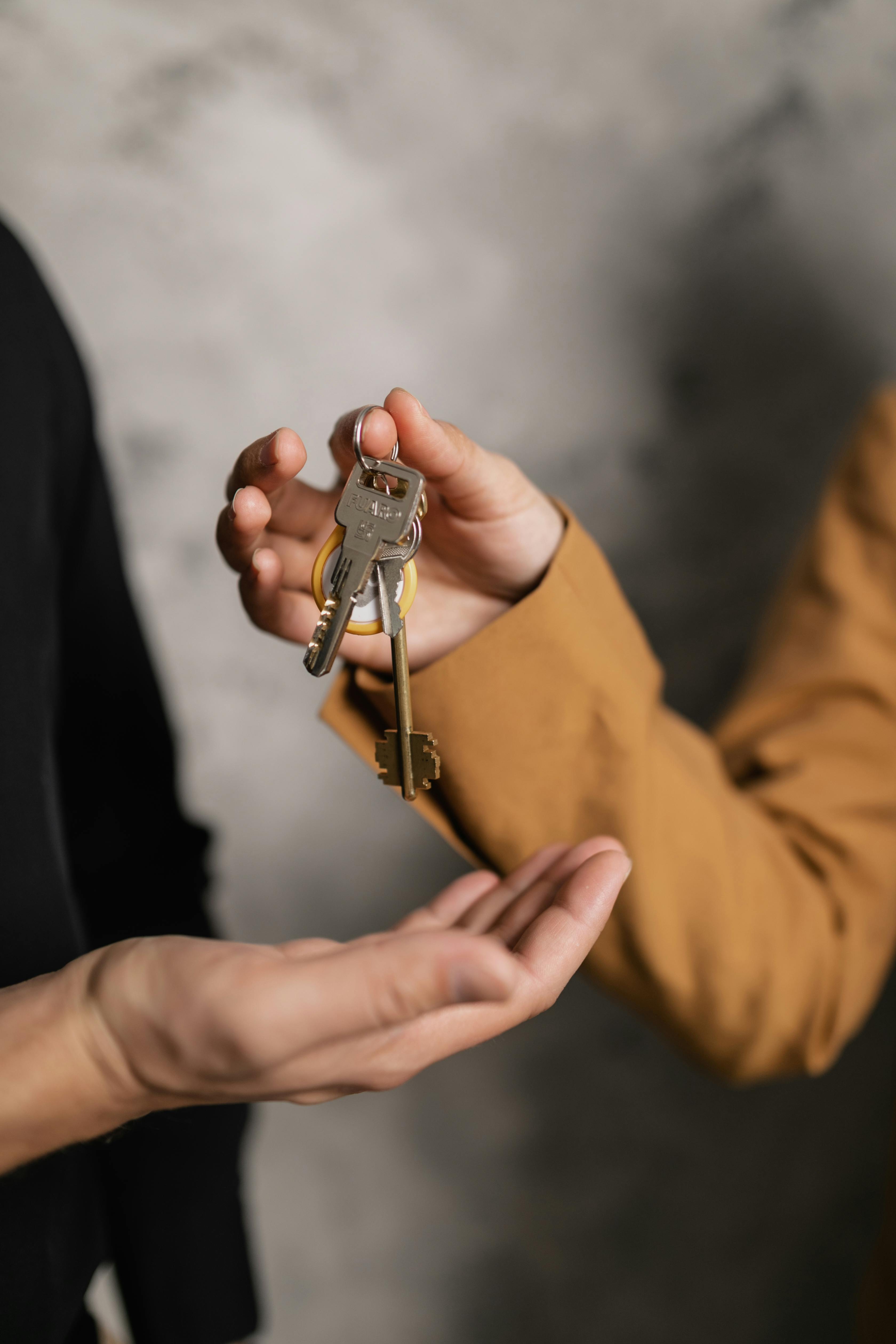 Professional locksmith handing keys to satisfied customer in Rocklin
